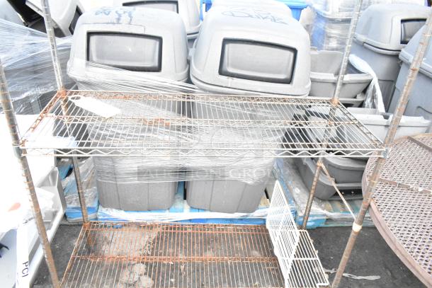 Chrome finish 3-tier wire shelving unit, visible rust and wear. Buyer must dismantle for shipping.