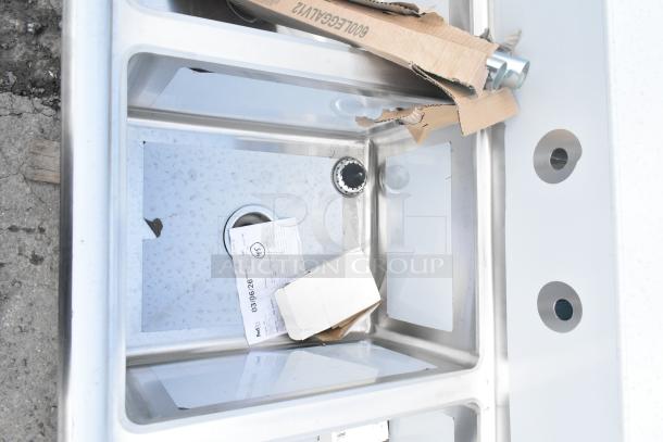 New Regency 600S31620218 commercial sink, 16-gauge stainless steel, three compartments, galvanized legs, two drainboards.