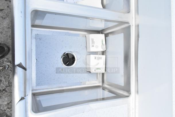 Brand new Regency 88" stainless steel commercial sink, three compartments, galvanized steel legs, scratch and dent condition.