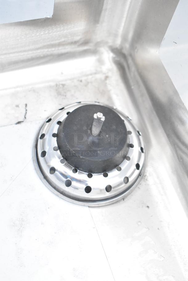 Regency 600S31620218 commercial sink, brand new, stainless steel, three compartments, galvanized legs, and two drainboards.