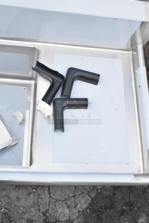 Brand new Regency 600S31620218 sink, 88" stainless steel, three compartments, galvanized legs, two drainboards, scratch and dent.