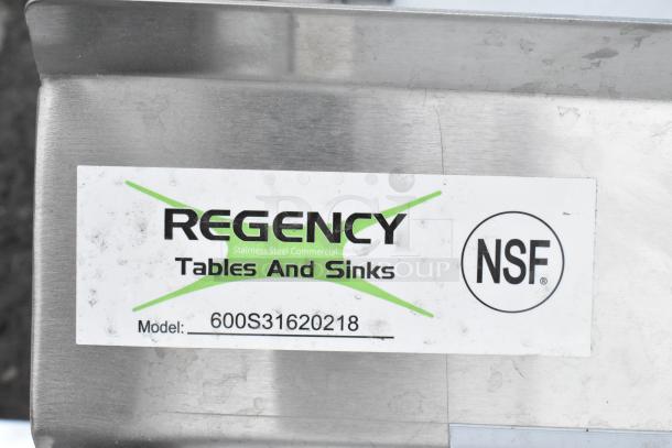 Alt text: Regency 600S31620218 commercial sink tag, showing model number and NSF certification on stainless steel.