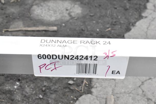 BRAND NEW SCRATCH AND DENT Regency 600DUN242412 aluminum dunnage rack, 24"x24"x12", 1,500 lb. capacity, shown with label.