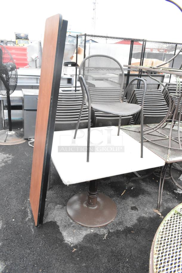 Three-item set: dining height chair, dining height table, and folding table. Metal and wood, fair condition. Auction lot.