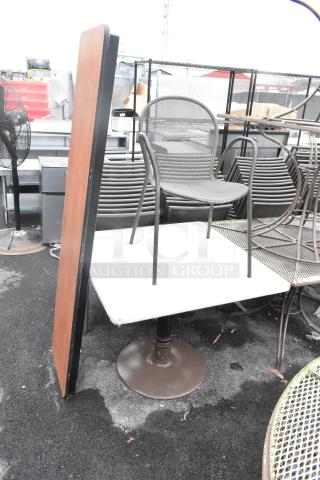 Three-item set: dining height chair, dining height table, and folding table. Metal and wood, fair condition. Auction lot.