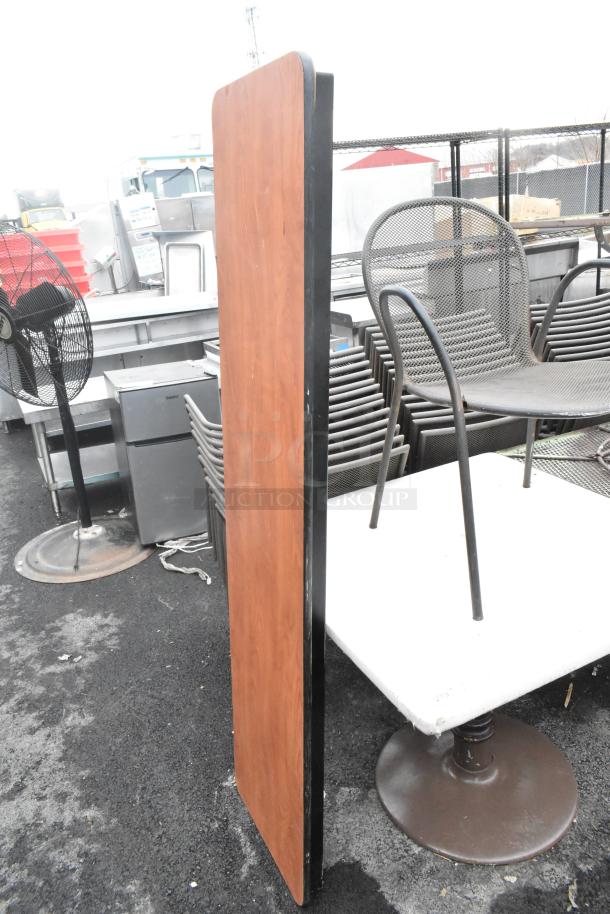 Dining height chair, dining height table, and folding table set. Metal and wood materials, used condition, industrial setting.