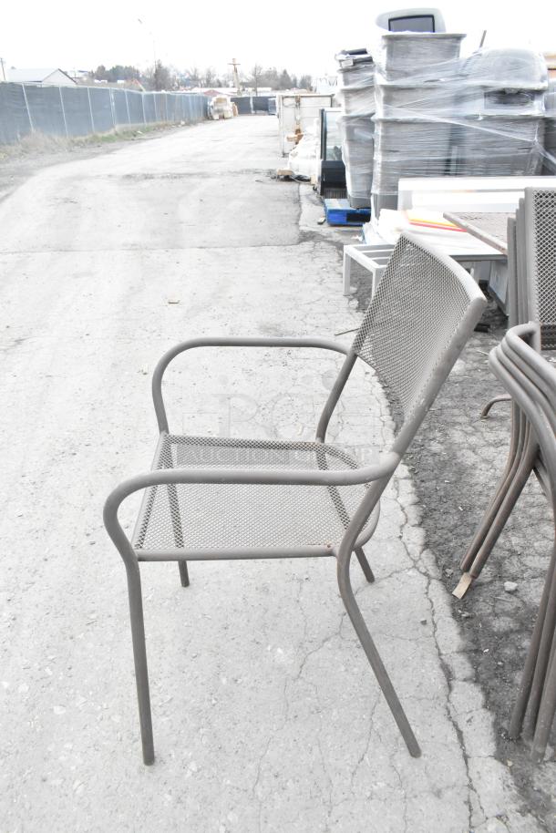 Metal mesh patio arm chairs, durable, stackable, weather-resistant, lot of 125, in used condition, ideal for outdoor use.
