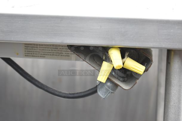 Commercial 2 Tier Over Shelf with Hatco GRA-24 warming strip. Features a stainless steel construction. Visible wiring detail.