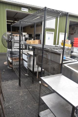 Black finish 3-tier wire shelving unit, excellent for storage. Requires buyer dismantling. Consider freight charges.