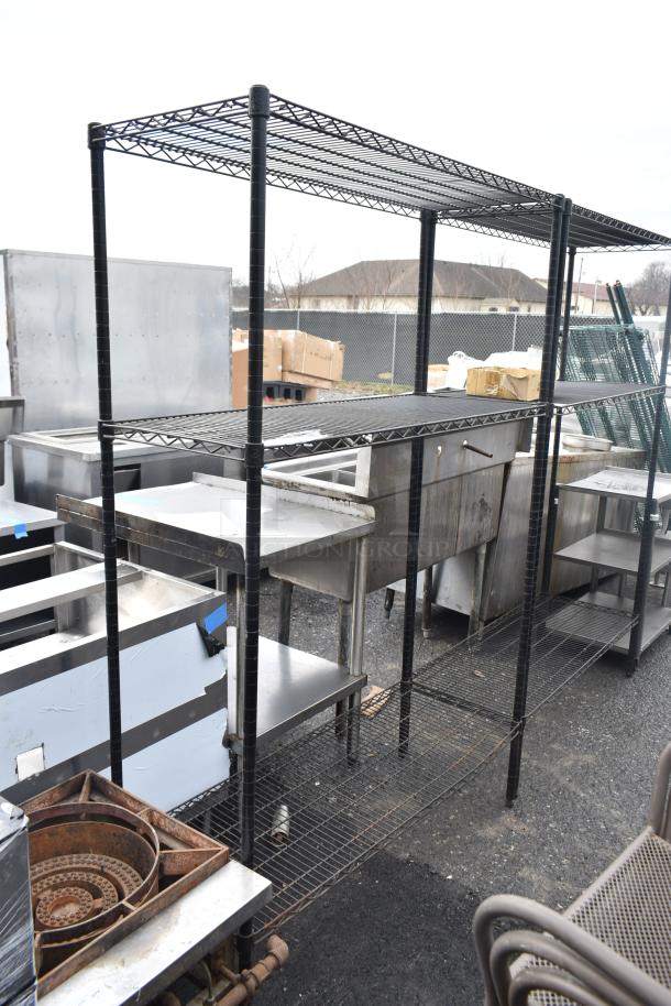 Black finish 3 tier wire shelving unit, dismantling required. Ideal for storage. Buyer arranges freight shipping.