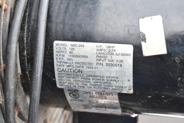 Lasko Floor Fan motor showing model NSC-243 label, 115 volts, 1 phase, 0.26 input kW, 1/4 HP, 2.7 amps, made in 1999.