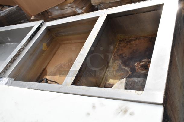 Stainless steel commercial steam table with three compartments, visible wear and rust spots, suitable for restoration.
