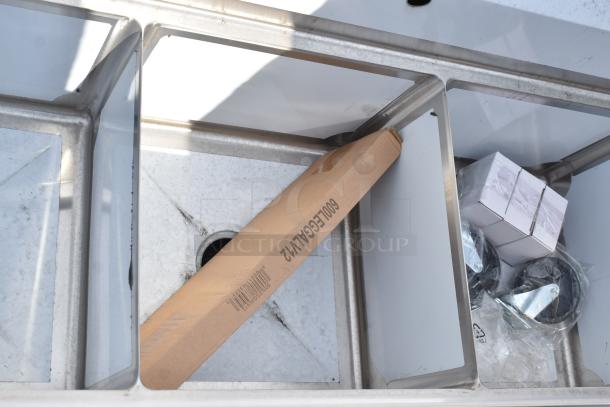 Brand new Steelton 522CS31818LR 90" stainless steel commercial sink with three 18" x 18" x 12" bowls, 2 drainboards.