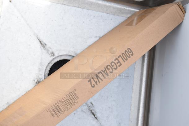 Steelton 522CS31818LR 90" stainless steel sink, 18-gauge, three compartments, two drainboards, new with scratches.