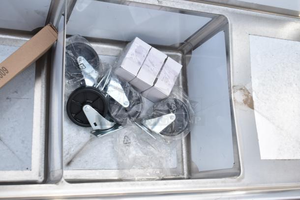 BRAND NEW Steelton 522CS31818LR 90" commercial sink, 18-gauge stainless steel, with 3 compartments and 2 drainboards. Contains attached parts.