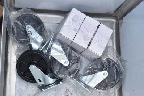 BRAND NEW Steelton 522CS31818LR 90" stainless steel sink with three compartments and two drainboards, scratch and dent condition.