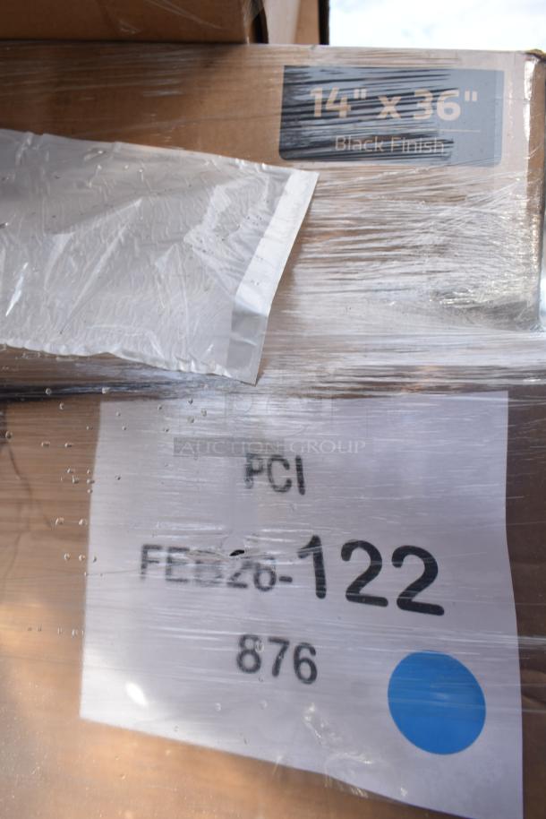 5 new scratch and dent items in packaging, including over shelf and urinal. Label reads "14 x 36" Black Finish," "PCI FEB26-122."