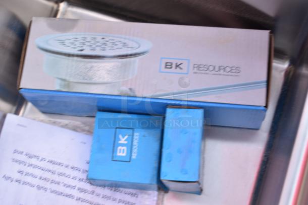 Brand new scratch and dent BK Resources BKS-2-18-12-18T 2 bay sink with dual drain boards, no legs, in box.