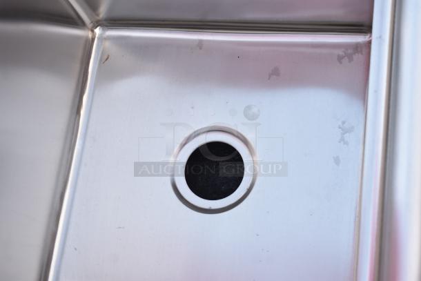 BRAND NEW SCRATCH AND DENT BK Resources BKS-2-18-12-18T 2 Bay Sink with drain boards, no legs, visible dents.