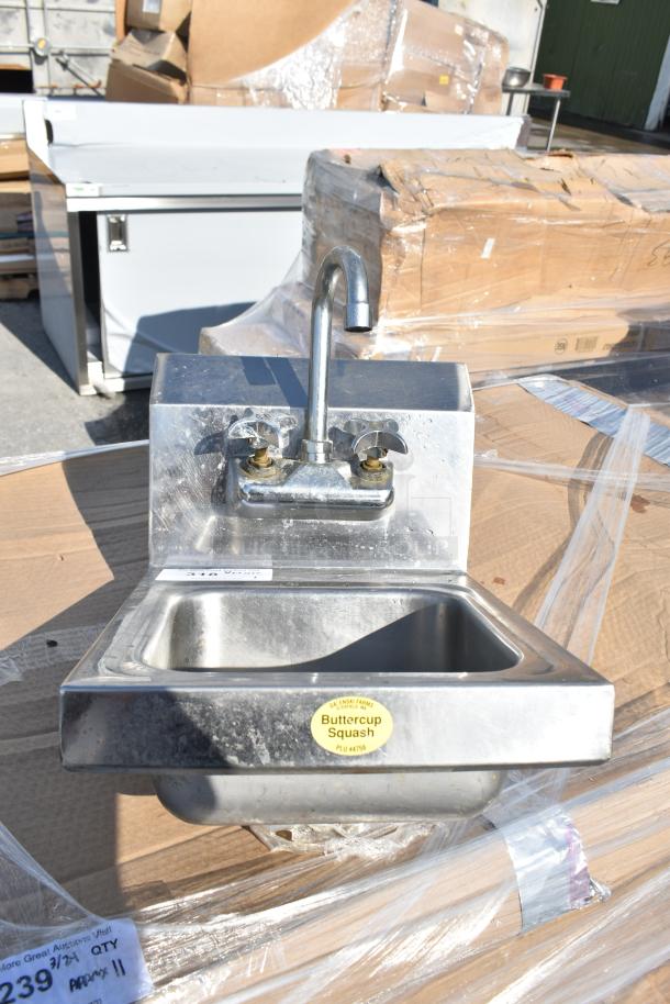 Commercial Single Bay Wall Mount Sink with dual handles and a high-arc spout. Good condition, stainless steel.