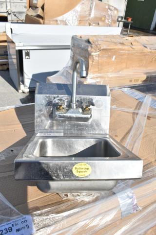 Commercial Single Bay Wall Mount Sink with dual handles and a high-arc spout. Good condition, stainless steel.