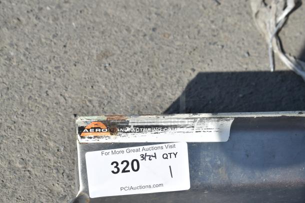 Commercial right side clean side dish table, Aero Manufacturing, added drain holes, no legs, visible wear on surface.