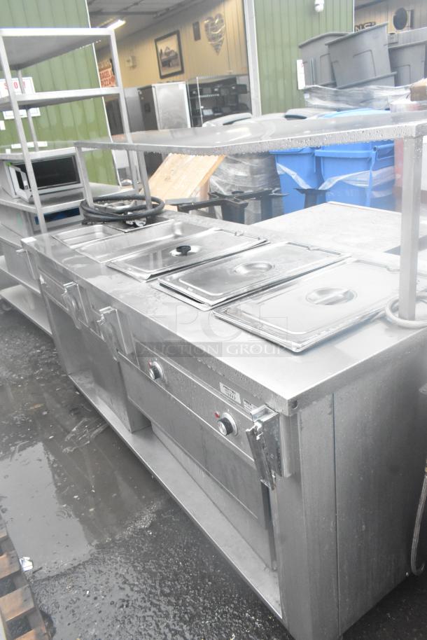 Dinex DHF6 Commercial Steam Table with over shelf and under shelf, 208 volts, stainless steel, good condition.