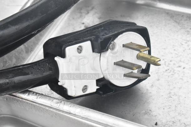 Dinex DHF6 commercial steam table power plug. Hubbell connector detail, suitable for 208 volts.