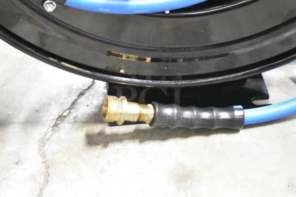 BRAND NEW Regency powder-coated steel air/water hose reel with hose, visible brass connector, slight scratches.