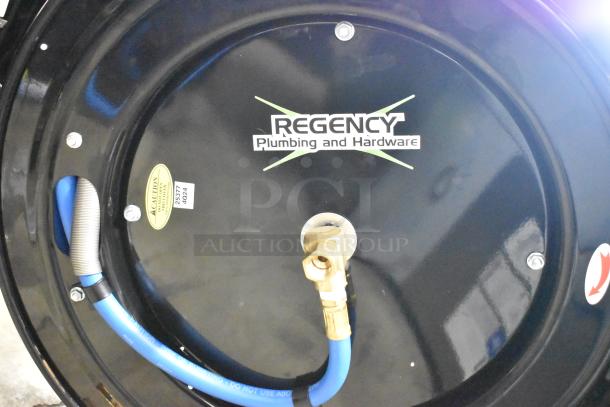 BRAND NEW SCRATCH AND DENT! Regency powder-coated steel air/water hose reel with hose, minor cosmetic blemishes.