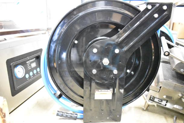 BRAND NEW Regency Open Powder-Coated Steel Air/Water Hose Reel with Hose, scratch and dent, includes warning label.