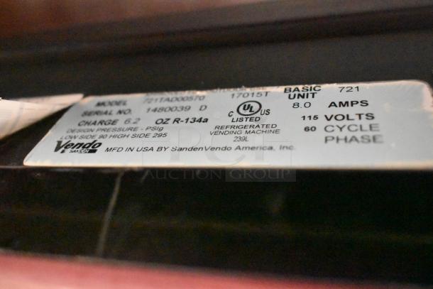 Vendo 721TAD00570 vending machine label, showing model, serial number, charge details, 115 volts, 8 amps, UL listed.