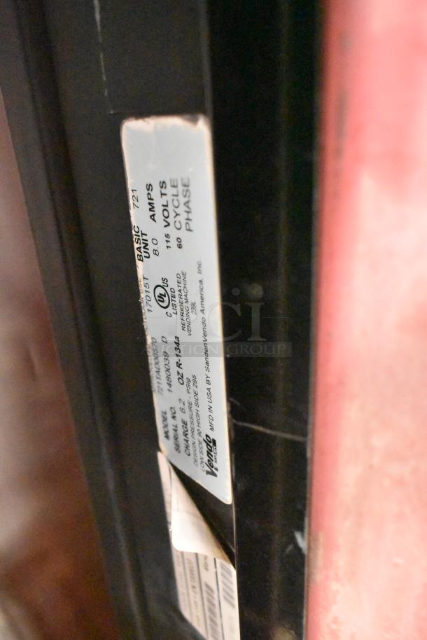 Vendo 721TAD00570 vending machine label showing power specs: 115 volts, 1 phase, and model details.