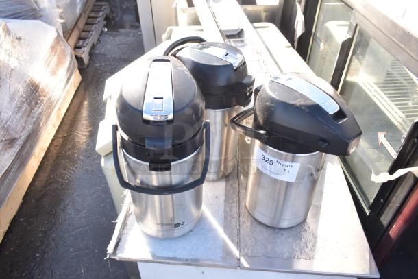 Three stainless steel countertop air pots with black lids. Each pot has a label showing "325 3X QTY x3", indicating quantity for auction.