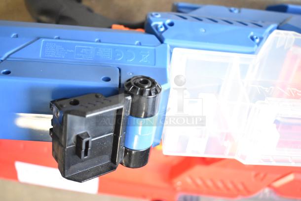 Close-up of blue and red Nerf Rival toy gun, showing detail and markings.
