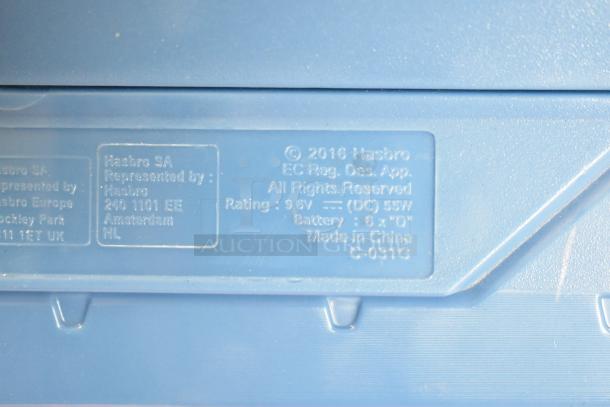 Clear label on Nerf Rival toy gun, showing Hasbro details, rating 9.6V, made in China, model C-031G.