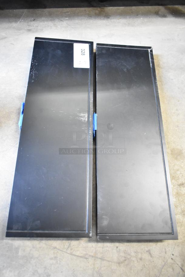 Two black shelves for auction, showing minor wear. Label on top left shelf reads "328". Auction offers two for the price of one.