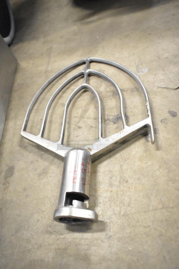 Hobart HL12B paddle attachment for Legacy 12-quart mixer, metal construction, light wear, marked "12 qt" in red.