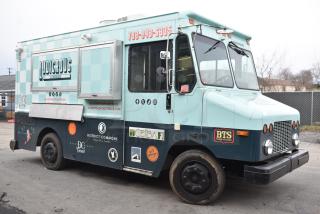 Freightliner Ludicrous Food Truck with propane hookup, grease hood, fryer, griddle, grill, refrigeration, serving window.