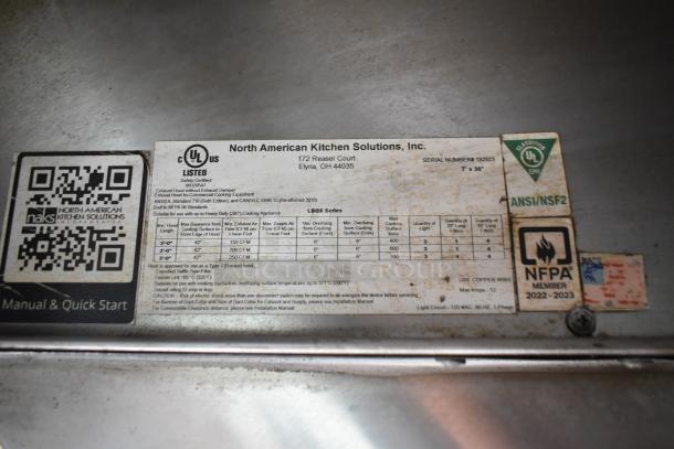 Label on the 2002 Freightliner Ludicrous Food Truck shows North American Kitchen Solutions, UL certification, NFPA member badge.