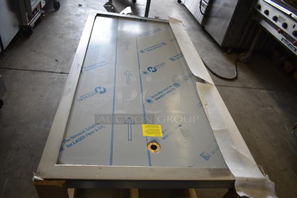 BRAND NEW SCRATCH AND DENT Hatco FTB-3 Commercial 57" frost top, three pan drop-in, 120V, 1 Phase, protective wrap visible.