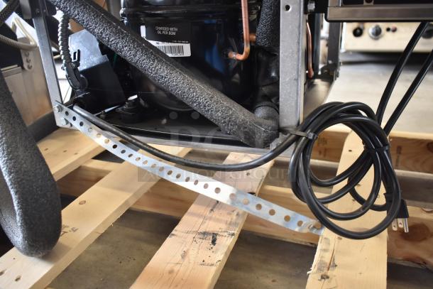 Hatco FTB-3 Frost Top, 57" three pan, new with scratches. Visible wiring, compressor, and "Charged with Oil" label. 120V, 1 phase.