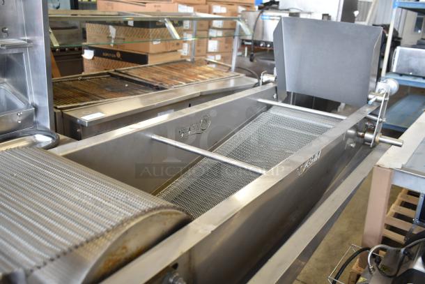 Lenin commercial gas chip fryer, conveyor style, 220,000 BTU, stainless steel, on casters, excellent condition.