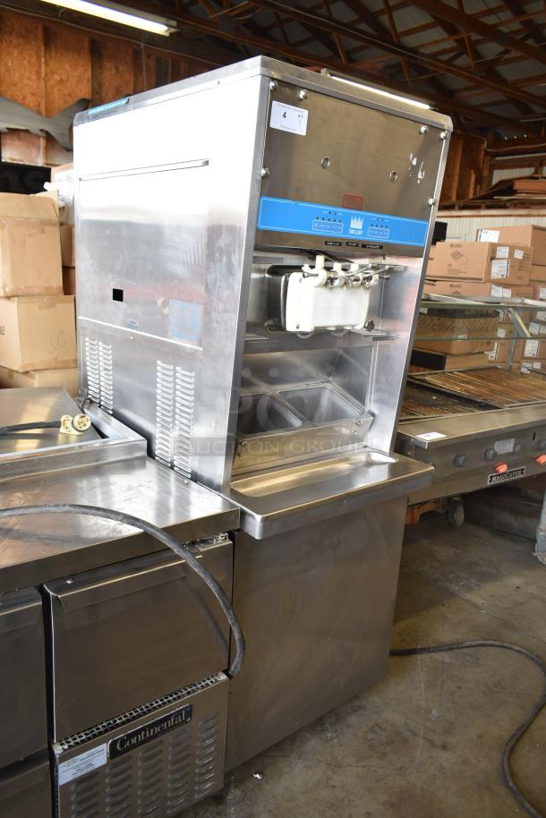 Taylor S757-33 commercial soft serve ice cream machine with 2 flavors and twist option, stainless steel, 208-230V, 3 phase.