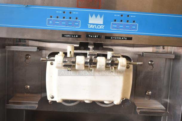 Taylor S757-33 commercial floor ice cream machine, 2 flavors with twist, visible controls, 208-230 volts, 3 phase.