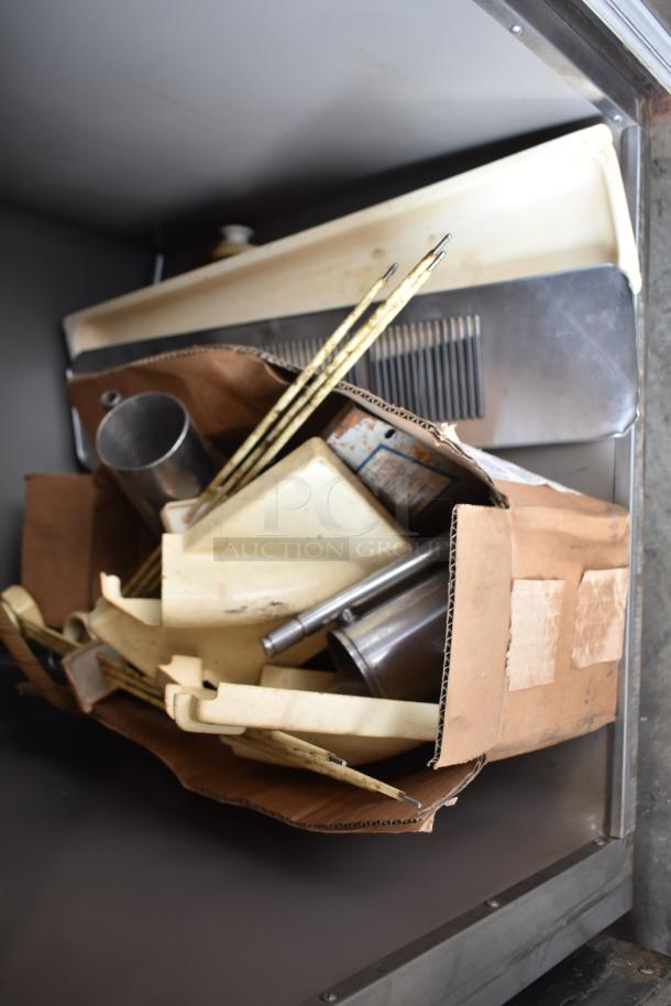 Taylor S757-33 soft serve ice cream machine, 2 flavor with twist, 208-230 volts, 3 phase, disassembled parts shown.