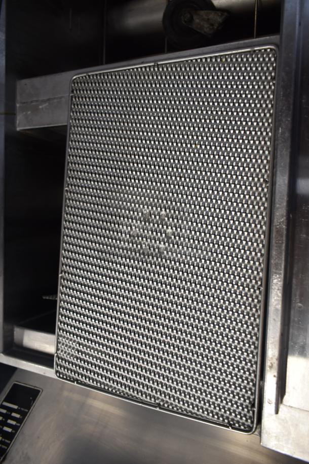 2019 Henny Penny OFG-322 2 Bay Deep Fat Fryer, natural gas, 170,000 BTU, on commercial casters, stainless steel, excellent condition.