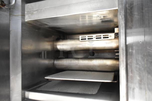 2019 Henny Penny OFG-322 2 bay deep fat fryer, natural gas, 170,000 BTU, commercial casters, interior view.