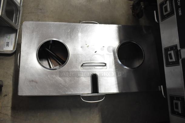 2019 Henny Penny OFG-322 gas-powered 2-bay deep fryer on casters, 170,000 BTU, stainless steel top, used condition.