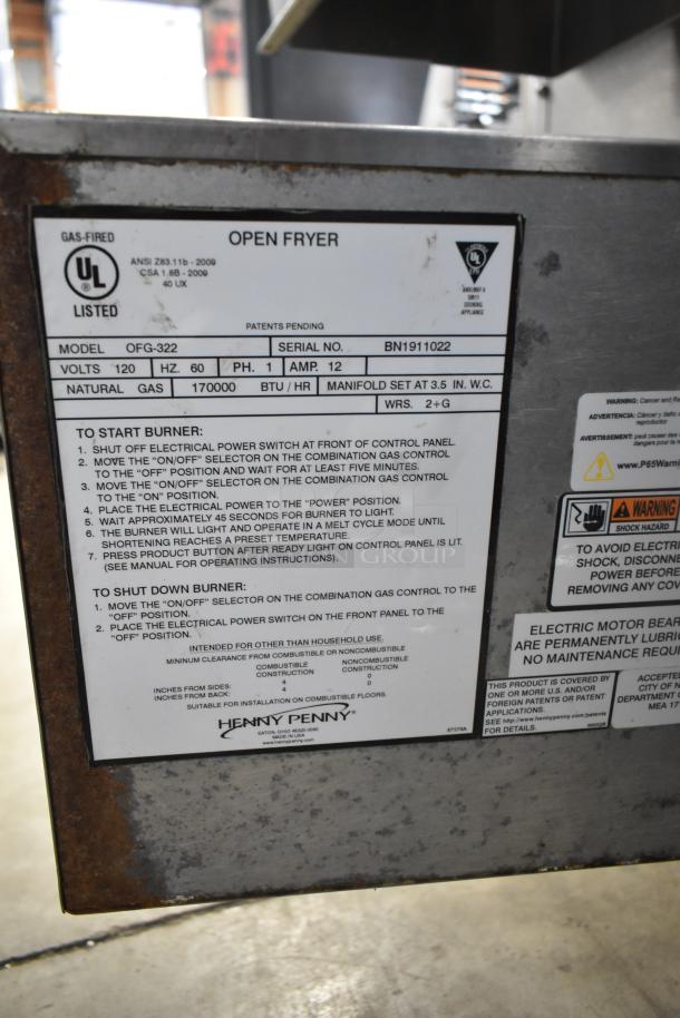 2019 Henny Penny OFG-322 commercial gas fryer on casters. Features 2 bays, 170,000 BTU, serial BN1911022. Model and usage info visible.